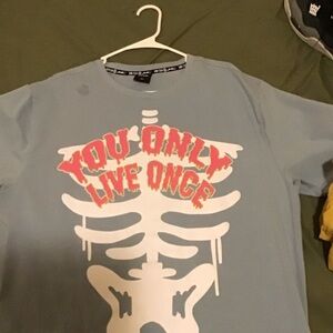 I am selling a 3Xl short sleeve graphic tee. I tried it on and it was too big.